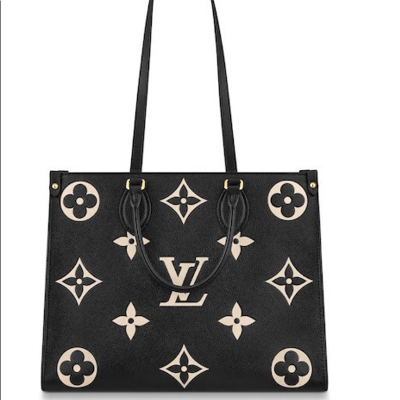 LV on the go black and cream MM Only one on Poshmark this bag  very hard to find - Picture 3 of 16